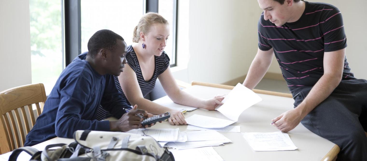 Students working at a table.