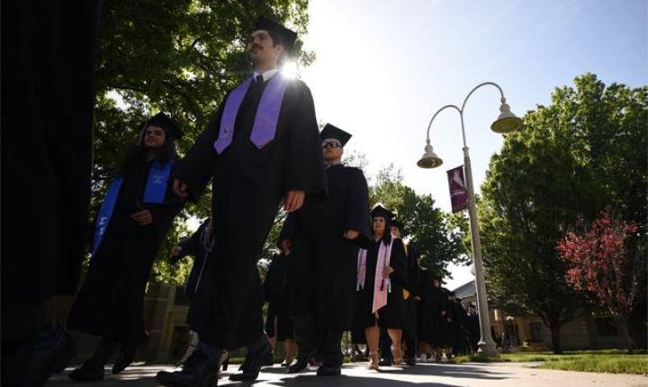 Students walking at Commencement 