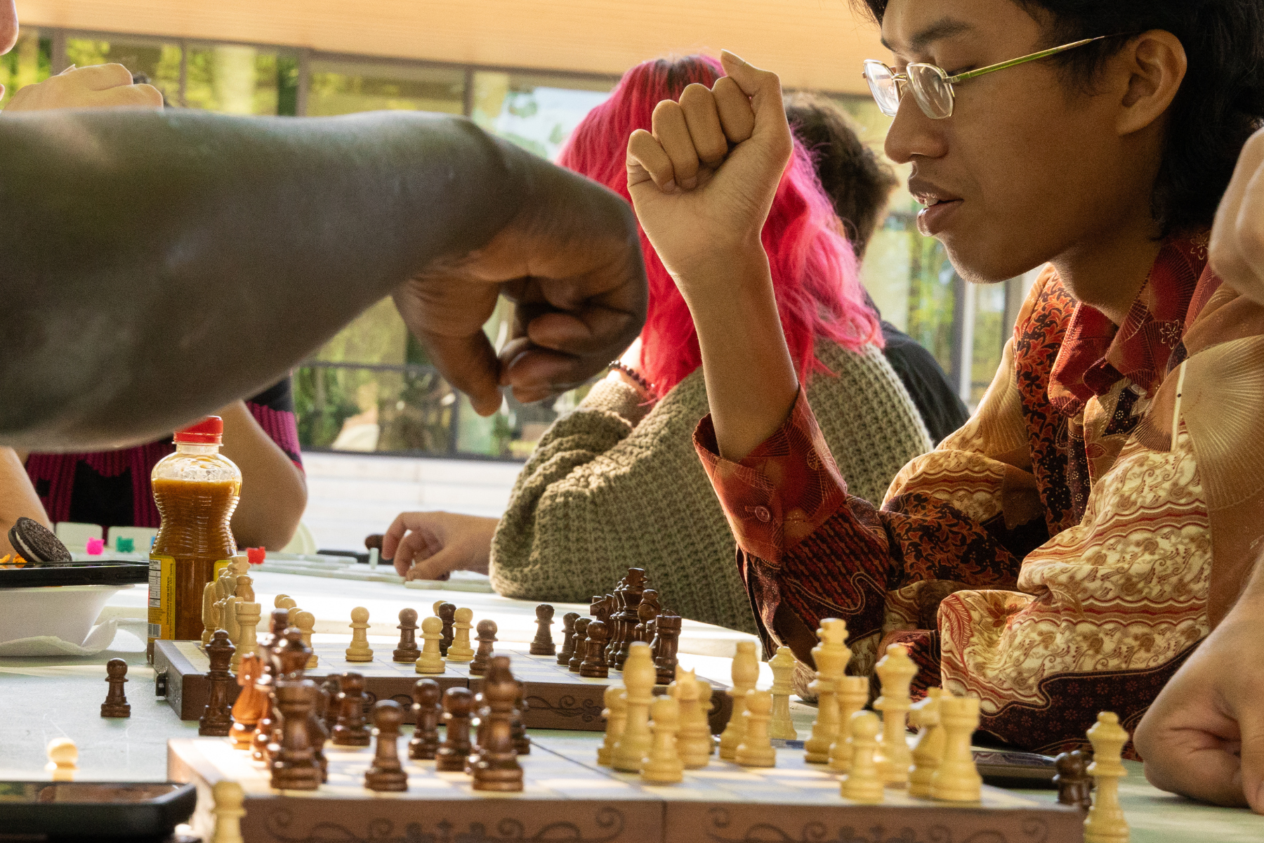 Students playing chess