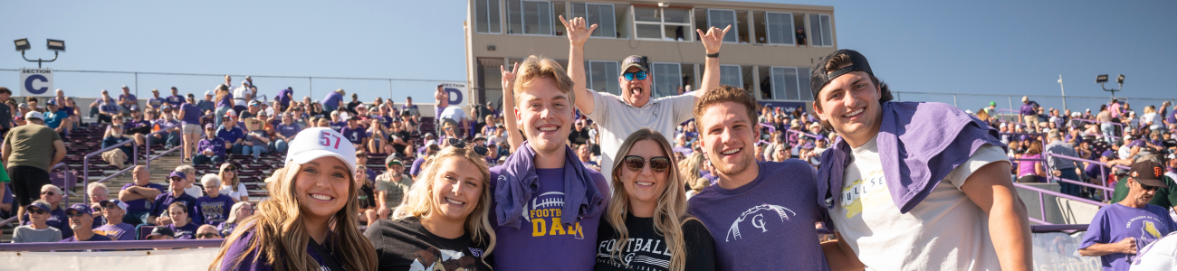 Football game, students watching